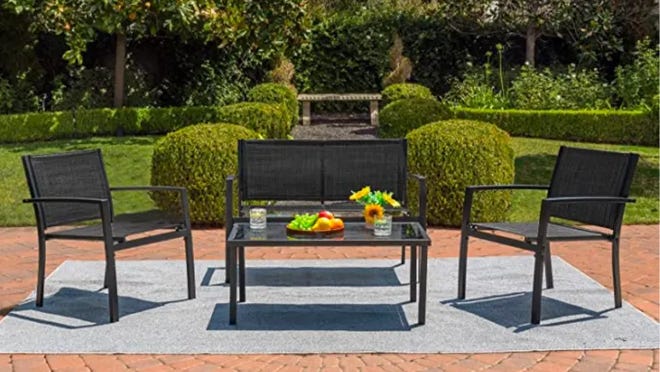 A simple black patio set for any outdoor space.