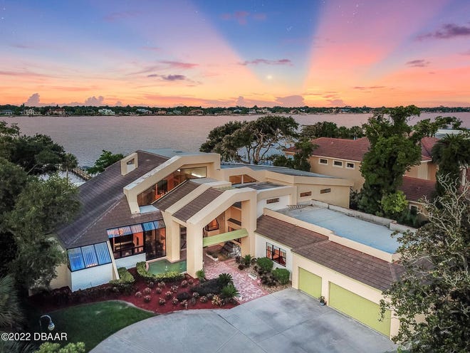 This breathtaking seven-bedroom, eight-and-a-half-bath riverfront estate, which sits on 1.33 acres in Ormond Beach, boasts a three-car garage and an in-law suite as well as architectural and artistic details throughout.