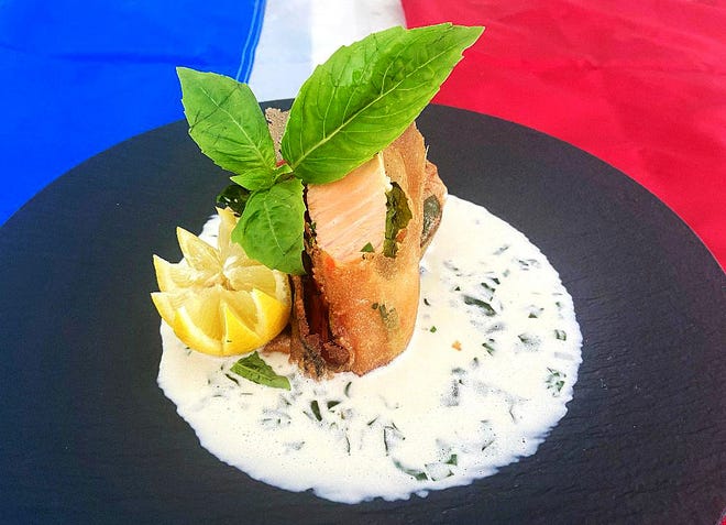 Papillote de salmon is among special dishes Cafe L'Europe will serve on Bastille Day on July 14.