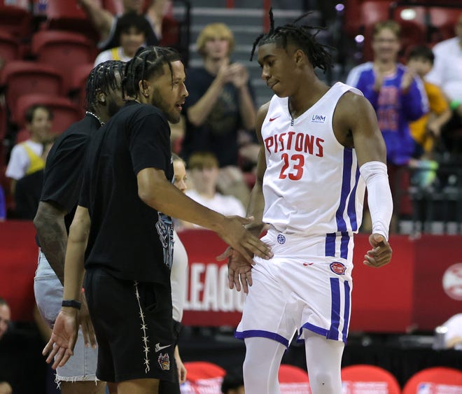 Pistons guard Jaden Ivey, right, is congratulated by teammate Cade Cunningham after scoring during the Pistons' 81-78 win over the Trail Blazers during Summer League on Thursday, July 7, 2022, in Las Vegas.