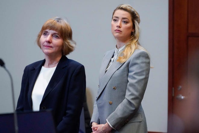 Amber Heard with her attorney Elaine Bredehoft before closing arguments in the Depp v.  Heard trial at the in Fairfax, Virginia, on May 27, 2022.