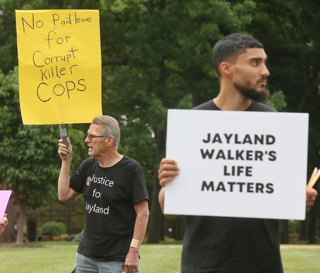 Akron police criticized for removing 'Justice for Jayland' signs