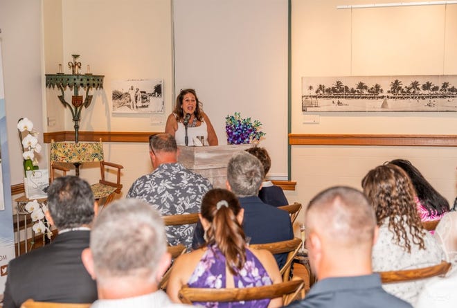 Kristen Bomas speaking to attendees at the launch event last month for her new book "The Journey of a Sage."