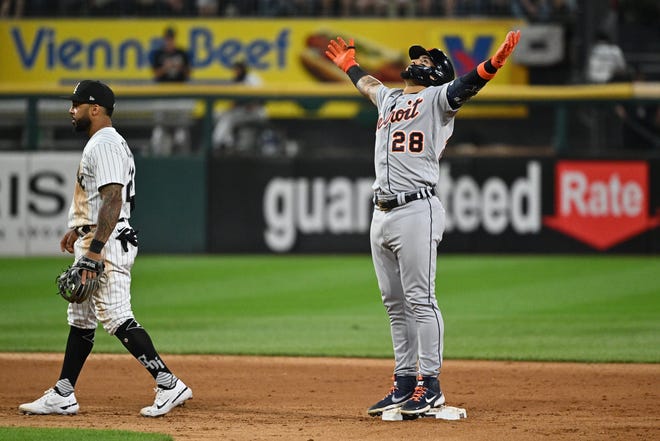 Tigers shortstop Javier Baez takes in the crowd's reaction after scoring a two-run double in the seventh inning in Chicago on Friday, July 8, 2022.