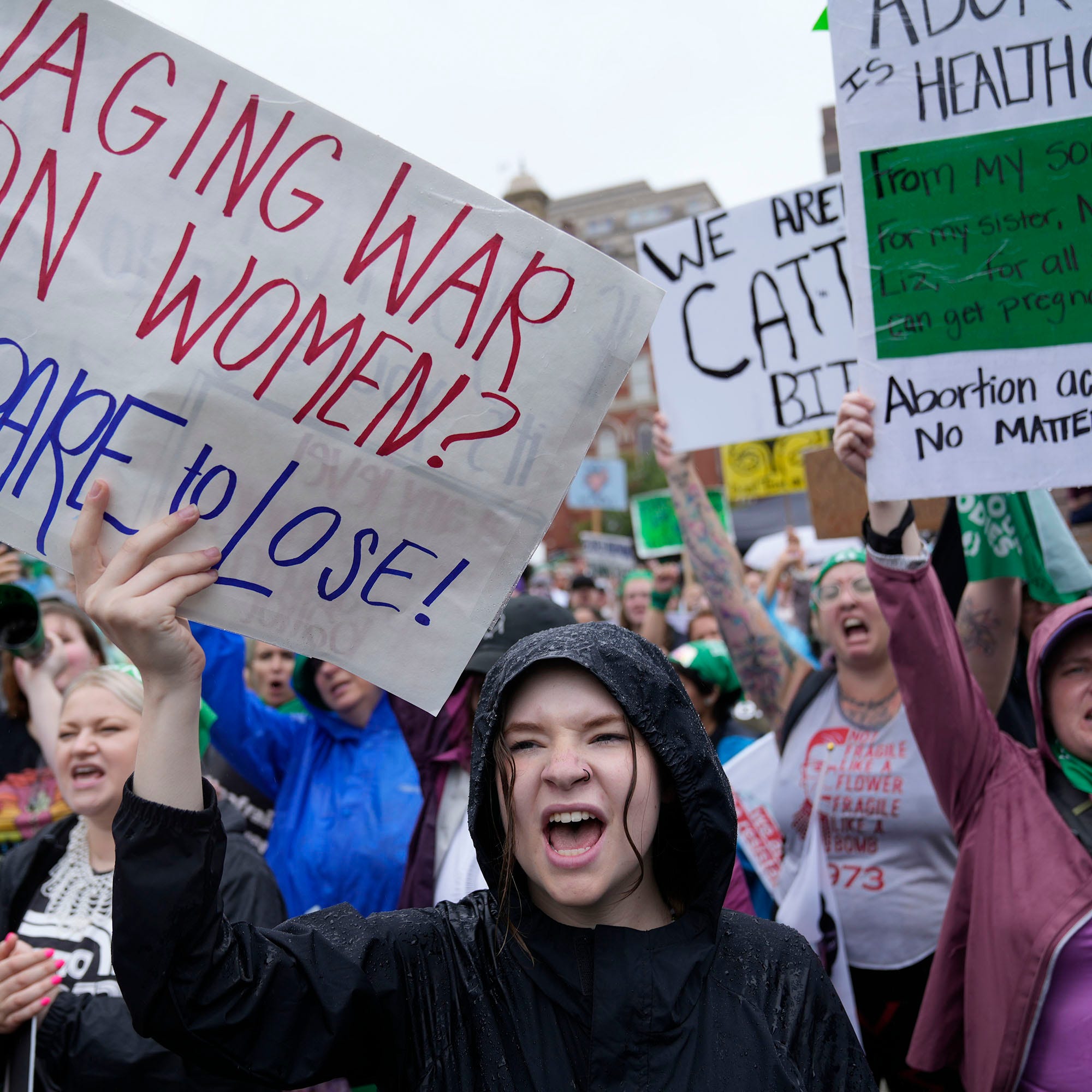 Ellie Sims of Washington, D.C., participates in the Women's March to Risk Arrest in front of the White House in Washington, D.C., on Saturday, July 9, 2022.