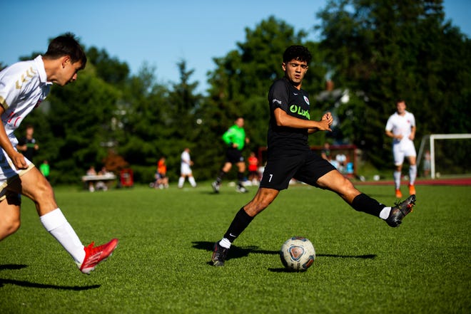 Tulip City's Paulo Alcala chases the ball during a game against Michigan Stars Saturday, July 9, 2022, at Holland High School.