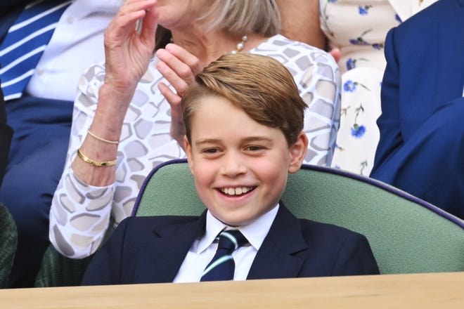 El príncipe George fue todo sonrisas durante Wimbledon el 10 de julio.
