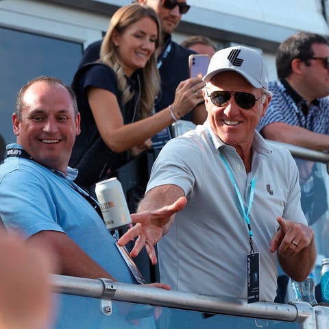 Greg Norman, CEO of LIV Golf, tosses beers to spec
