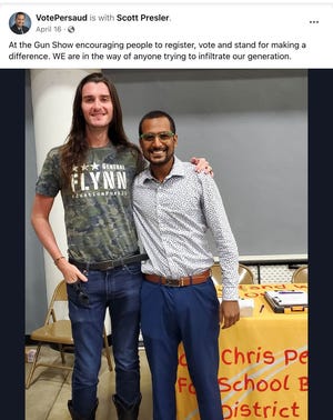 School board candidate Chris Persaud (right) stands with conservative activist Scott Presler for a photo at an April gun show in West Palm Beach. Persaud uploaded the image to his campaign's Facebook page.