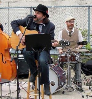 Scott Ricciuti, left, and Duncan Arsenault performing with Pistol Whipped.