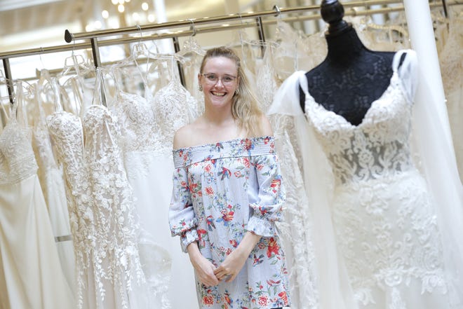 Tiffani Ebben, owner of Tiffani's Bridal, has relocated her business to the second floor of 210 W. College Avenue. She is pictured on the showroom floor Thursday, July 7, 2022, in Appleton, Wis. 
Dan Powers/USA TODAY NETWORK-Wisconsin