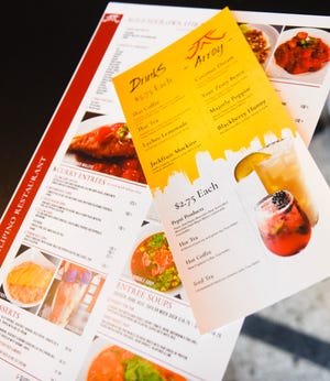 Arroy's new food and drink menus are pictured Monday, July 11, 2022, in St. Cloud.