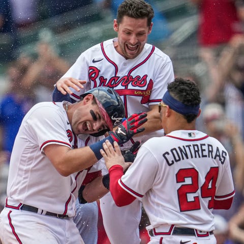 Braves players celebrate a walk-off win against th