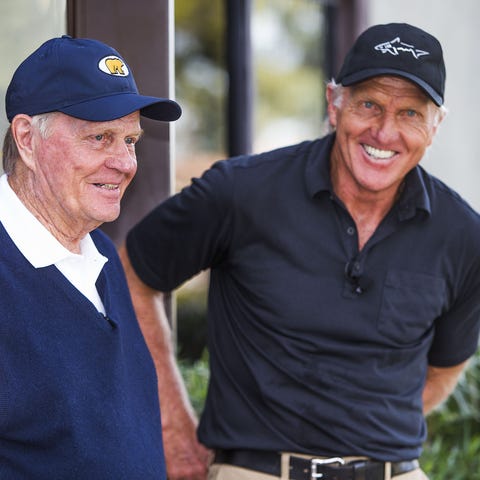 Golfing legends Jack Nicklaus (left) and Greg Norm