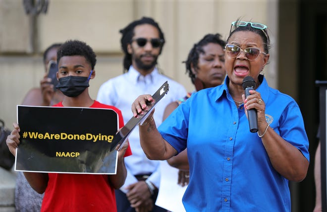 Judi Hill, president of the Akron chapter of the NAACP, speaks Monday during a rally protesting the police shooting of Jayland Walker outside Akron City Hall.