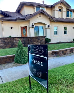 A house is for sale in Sparks on July 8, 2021.