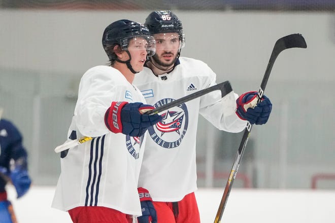 Blue Jackets forwards Kent Johnson (left) and Kirill Marchenko are fifth and 18th, respectively, in rookie scoring.