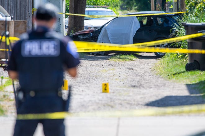 Police investigate at the scene of an incident Wednesday, July 13, 2022 in the 1900 block of South Michigan Street. 