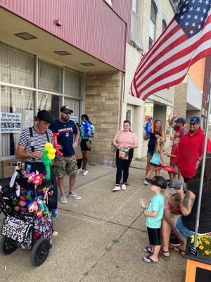 In addition to the music, Second Saturday featured the Flower Clown from Cleveland making balloon animals and balloon hats for children, a beer/wine garden, a food truck and other vendors along Main Street.