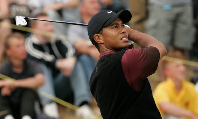 July 17, 2005 -- Tiger Woods shoots 14 under on the eighth at St. Andrews en route to winning the British Open.