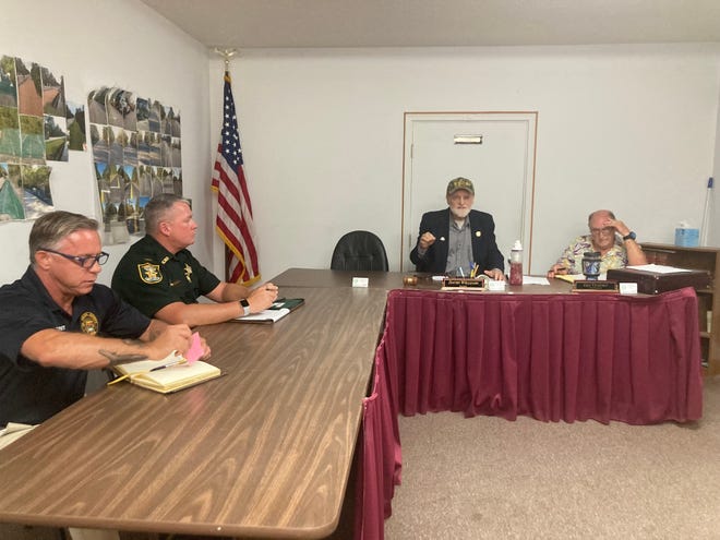 Community leaders and government officials meet this month at the Flagler Estates Road and Water Control District office at 9850 Light Ave. Around 40 people gathered to discuss concerns about dogs running loose in the community.