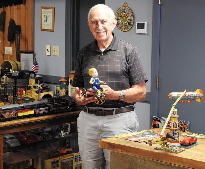 Richard Hoover holds a wind-up toy in The Toy Cellar in the basement of the Hay Craft Center in Roscoe Village. It features about 800 pieces from Hoover's private collection amassed over 50 years ranging from the 1860s to the 1960s.