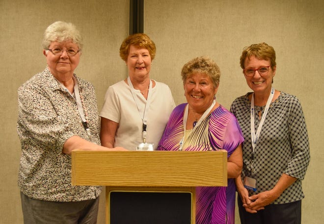Four members of the Gold Diggers Investment Club attended the 45th Annual Elections and Awards Meeting of the Northwest Buckeye Chapter of Better Investing at Way Public Library in Perrysburg on June 28 to accept an award for the club’s 35th anniversary. Shown here are, left to right: Peggy Debien, Ellen Honsperger, Parm Boyer and Vicki Schade.