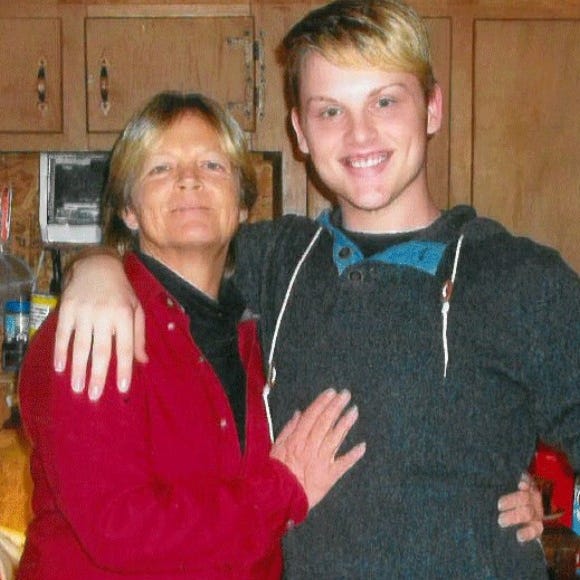 The late Stephen Smith, right, with his mother Sandy.