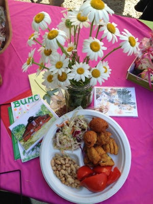 A plate of catfish, white beans, coleslaw, and hushpuppies at the Bethlehem United Methodist Church's annual fish fry.