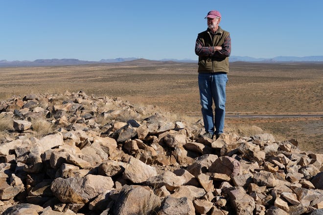 Jim Eckles stands on Mt. Aden, southwest of Las Cruces. Eckles, a historian, will be giving a talk about Victorio Peak, in August at the New Mexico Farm and Ranch Heritage Museum