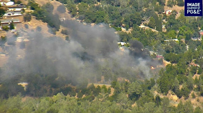 A vegetation fire was burning Wednesday afternoon on July 13 in the area of Valley Vista Court and Backbone Road in Jones Valley.