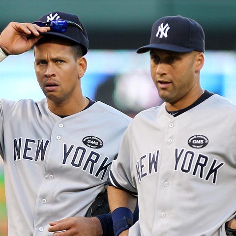 Alex Rodriguez and Derek Jeter during a pitching c
