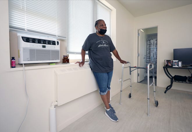 Yolanda Lee, is pictured in her apartment on Western Avenue in Yonkers, July 15, 2022.  Lee depends on her air conditioner to survive living in an urban heat island. 
