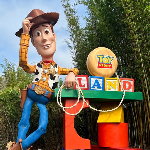 Woody welcomes guests to Toy Story Land at Disney'
