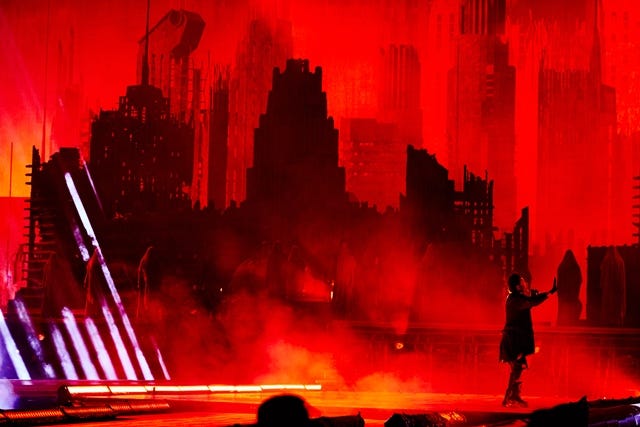A skyline of burned buildings set a dark tone for The Weeknd's After Hours Til Dawn tour, which kicked off Thursday in Philadelphia.