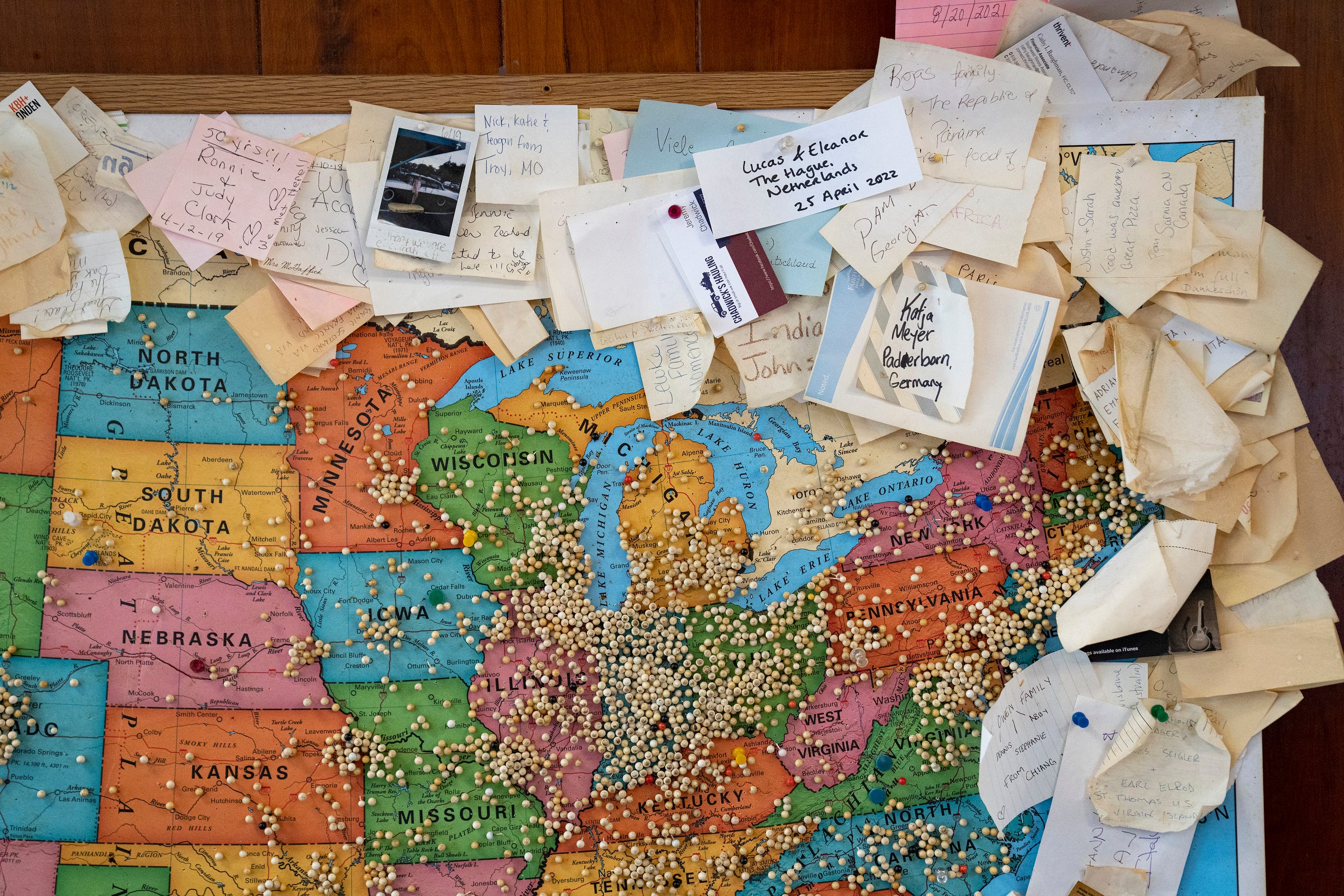 A United States map clustered with pushpins and sticky notes shows where out-of-town diners have come from Saturday, July 16, 2022, at Steer-In on the east side of Indianapolis. 