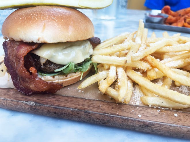 The “Lake Park Burger” with “Truffled Parmesan Shoestring” fries from Lake Park Diner, Naples.