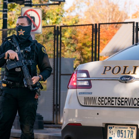 FILE - A U.S. Secret Service officer takes a posit
