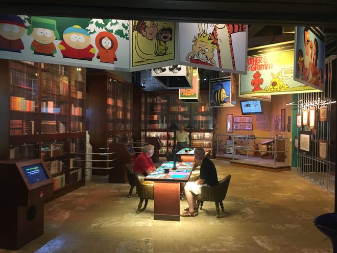 Visitors peruse the cartoon and print comedy archives  at the National Comedy Center.