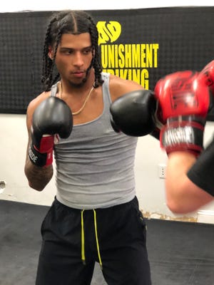 Axel Lopez trains at Punishment Striking Systems for the upcoming bout.
