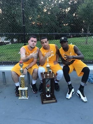 From left, Anthony Barbosa, Tyrae Sims and Markese Berry at the Summer Jam Classic.