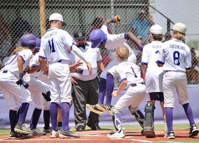Wylie's Ceddrick Lara jumps on home plate after hitting a home run against Lubbock Western in the Texas West State Little League Tournament on July 18. Lara scored on a two-out wild pitch in the seventh inning as Wylie beat Louisiana 4-3 in the Southwest Regional opener Thursday in Waco.