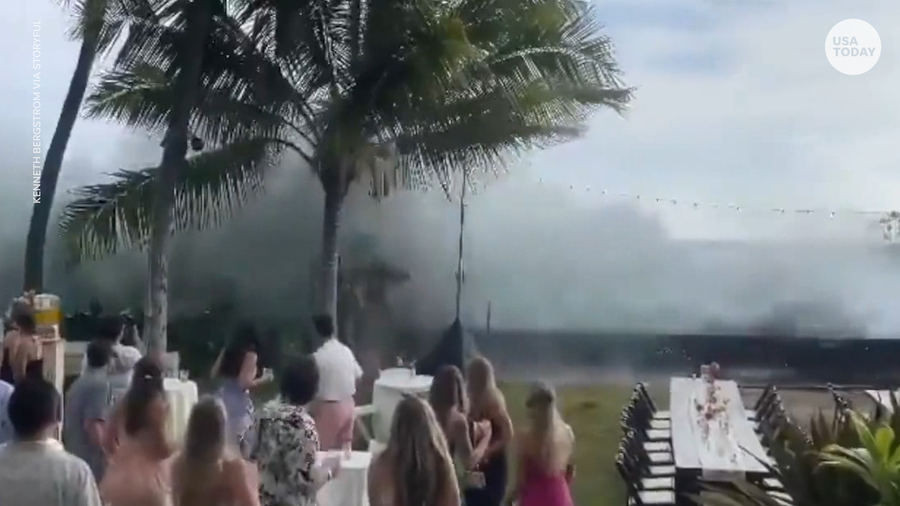 'Historic' waves crash wedding party in Hawaii