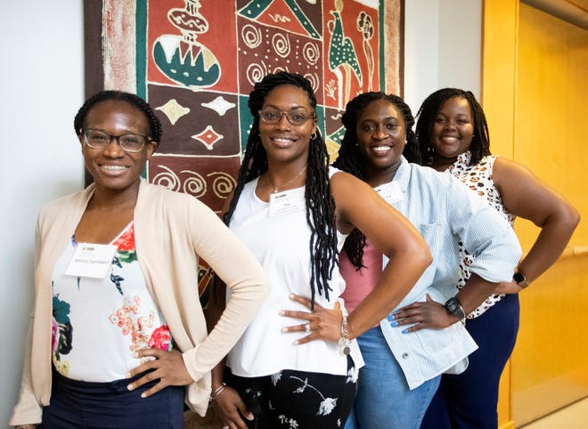 Jessica Saintibert, Joy Jefferson-Yager, Sherita Ingram and Ericka Horne (L to R) pose for a portrait Thursday, July 14, 2022, during a FAMU Research Bootcamp for women of color in Florida who are STEM scholars. 