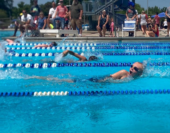 Waverunners swimmer Zach Bokor races through the first 50 yards of the boys 11-12 100 freestyle.