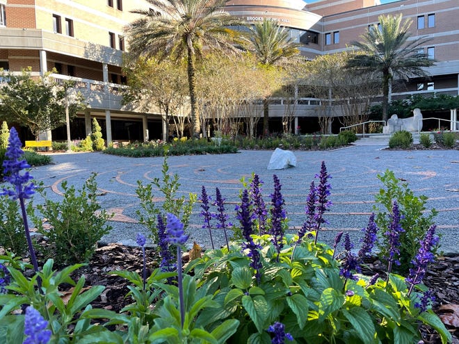 The Healing Garden at the center of the UNF campus, a peaceful area complete with a maze, student art and seating.