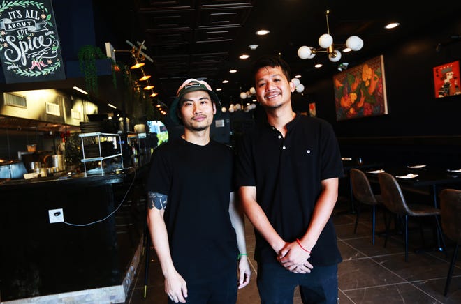 Malis owning partners Nero Keo, left, and Sotheavong Meas, in the new restaurant on Tuesday, July 19, 2022.