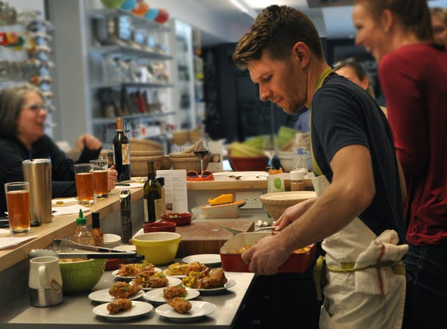 A cooking class at Artichoke.