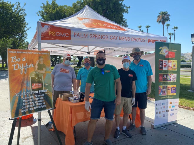 Henry Doering, Steve Baker (back row), Jeff Kopasz, Bill Butler and Douglas Wilson man the booth at the Palm Springs Gay Men's Chorus' 2020 school supply drive.