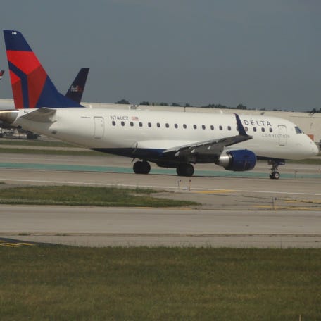 A Delta Connection Embraer E170 jet is seen taxiing at Detroit Metro Airport on June 30, 2011. The plane belongs to Delta Connection affiliate Compass Airlines, which flies regional flights for Delta Air Lines. [Via MerlinFTP Drop]